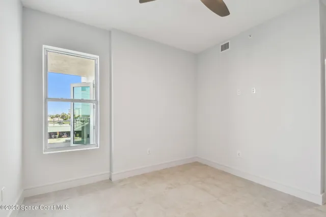 a very nice looking room with a large window