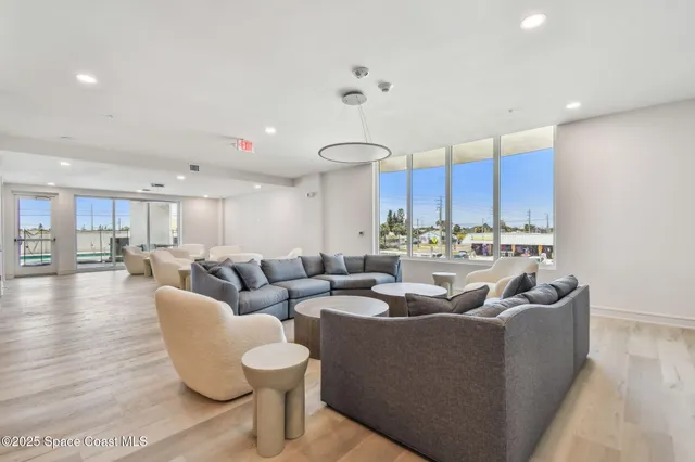 a view of outdoor kitchen with outdoor seating
