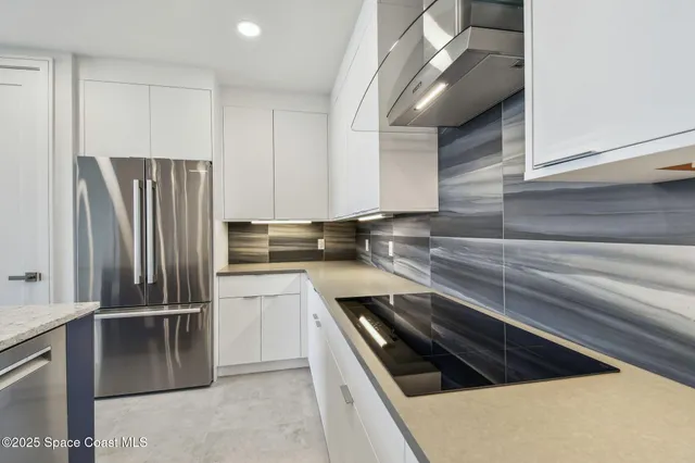 a bed room with furniture and a chandelier