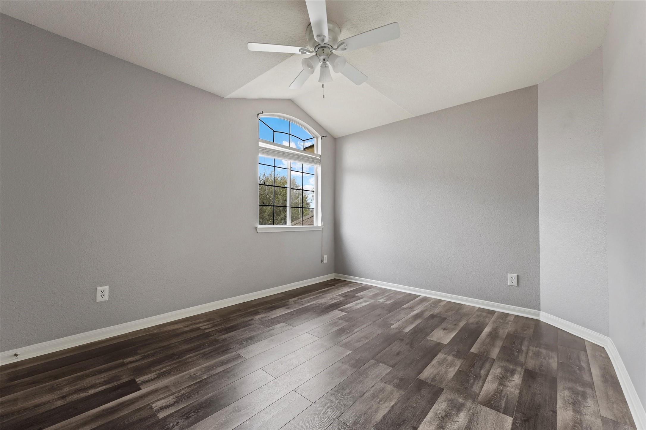 24522 Forest Path Court Spring, TX 77373 - Photo 14 of 18 wooden floor in an empty room with a window