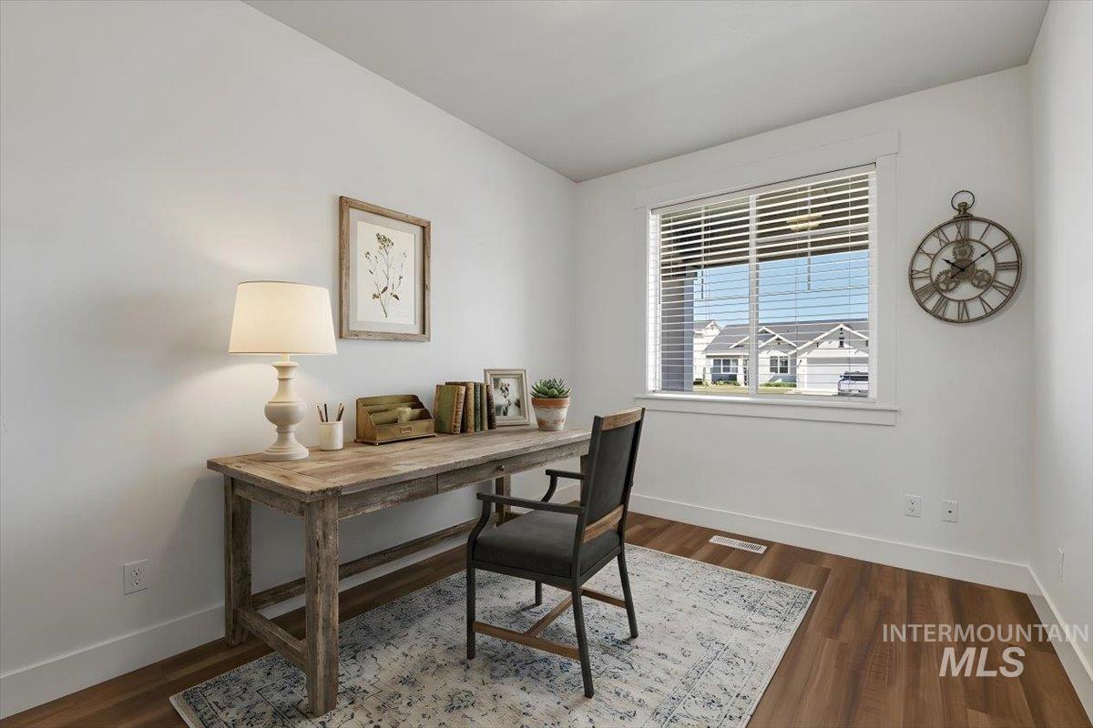 2109 North Gelding Court Middleton, ID 83644 - Photo 24 of 39 Office area featuring baseboards and dark wood-style flooring