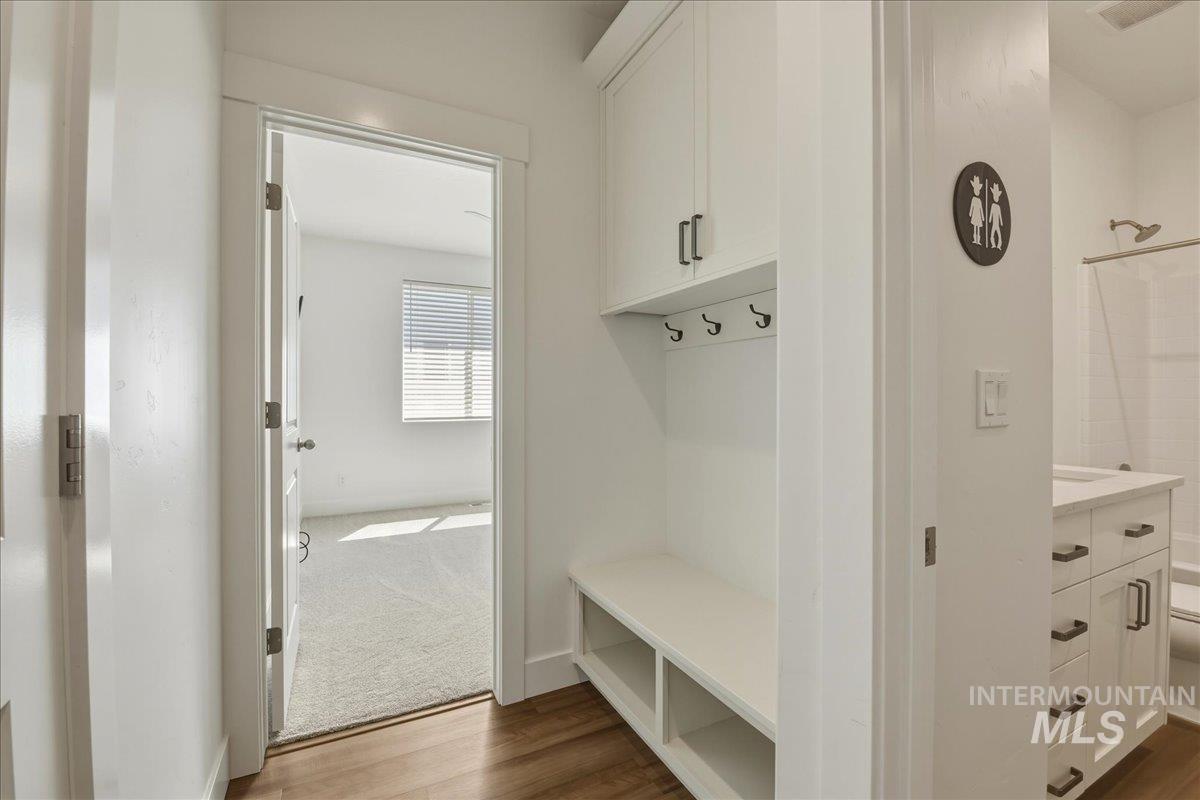 2109 North Gelding Court Middleton, ID 83644 - Photo 31 of 39 Mudroom featuring light wood finished floors and built ins.