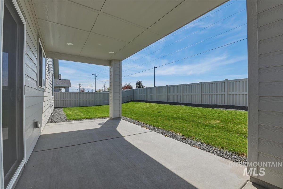 2109 North Gelding Court Middleton, ID 83644 - Photo 32 of 39 Fenced backyard with a patio area