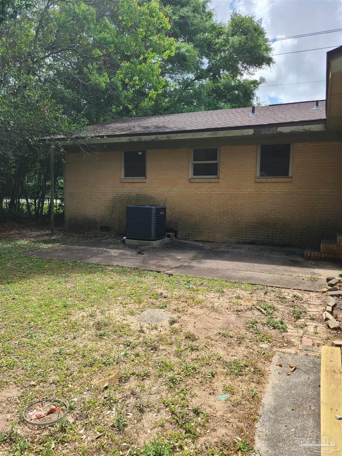 7758 Kipling Street Pensacola, FL 32514 - Photo 23 of 23 a backyard of a house