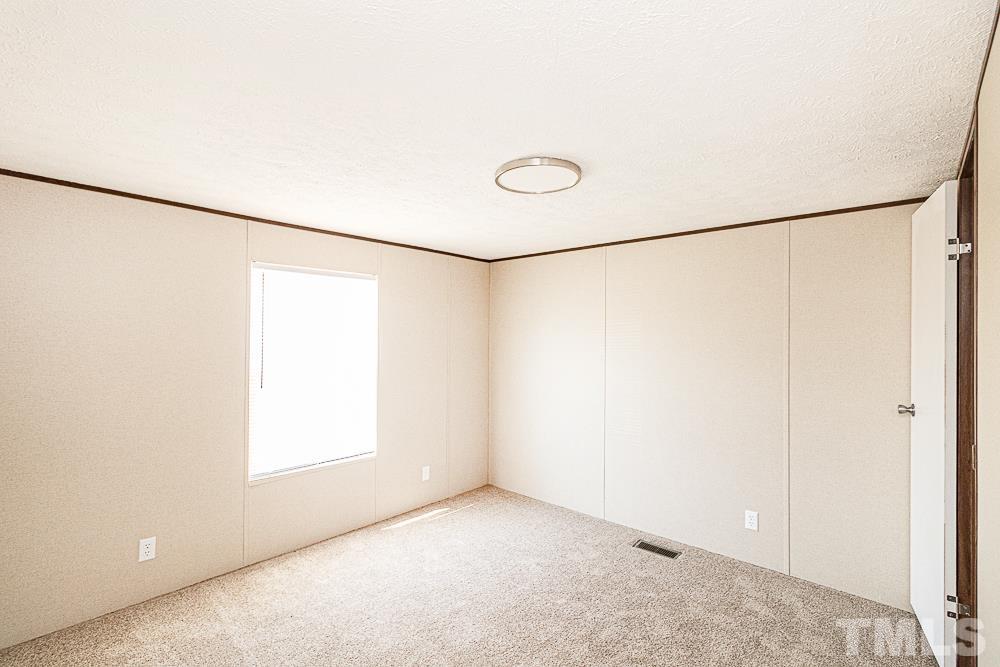 7252 Broad Leaf Dr Spring Spring Hope, NC 27882 - Photo 11 of 17 a view of a room with a empty space