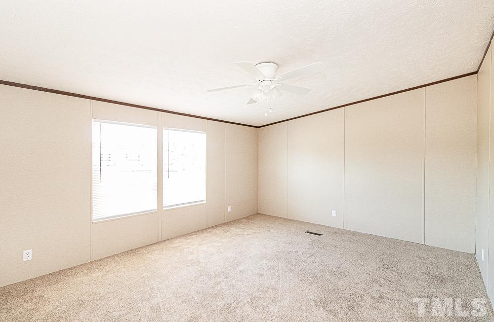 7252 Broad Leaf Dr Spring Spring Hope, NC 27882 - Photo 9 of 17 a view of an empty room with a window