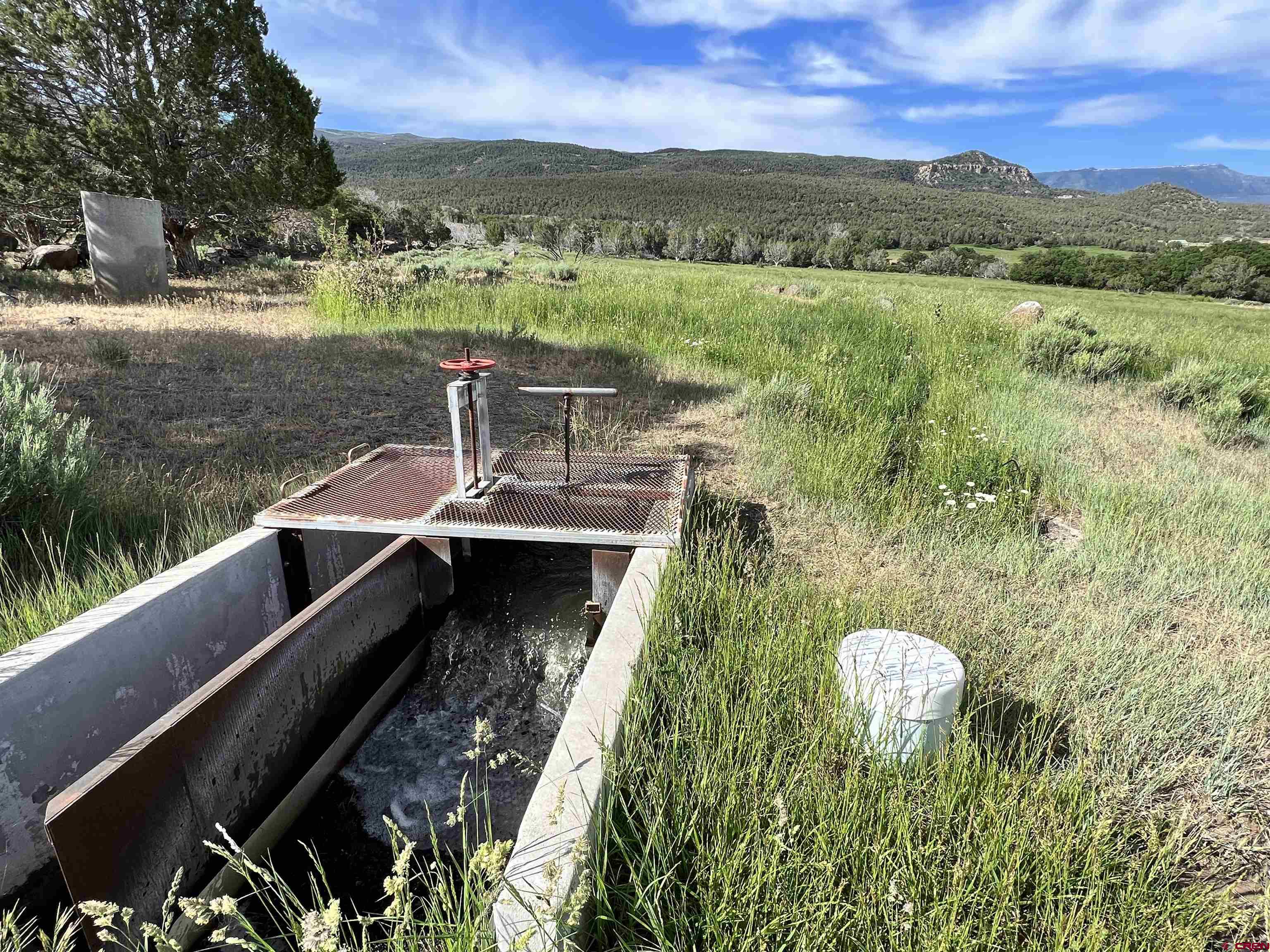 51804 KE Road Mesa, CO 81643 - Photo 22 of 29 a view of a lake from a balcony