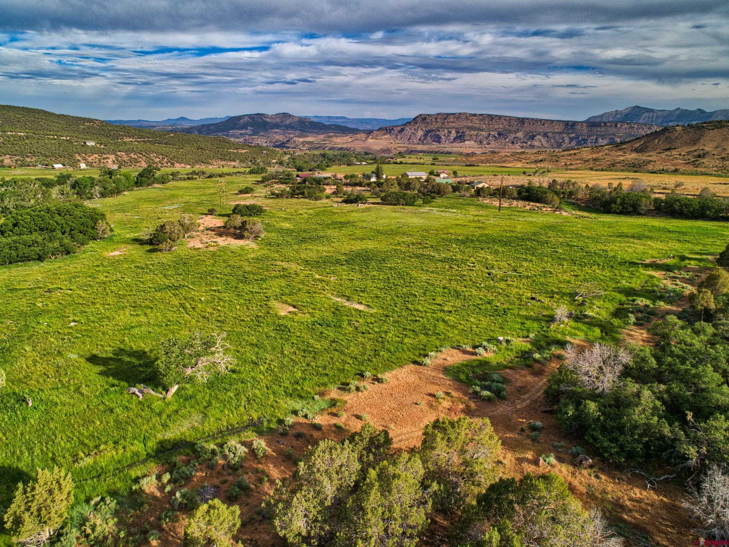 51804 KE Road Mesa, CO 81643 - Photo 9 of 29 a view of a city with an ocean view