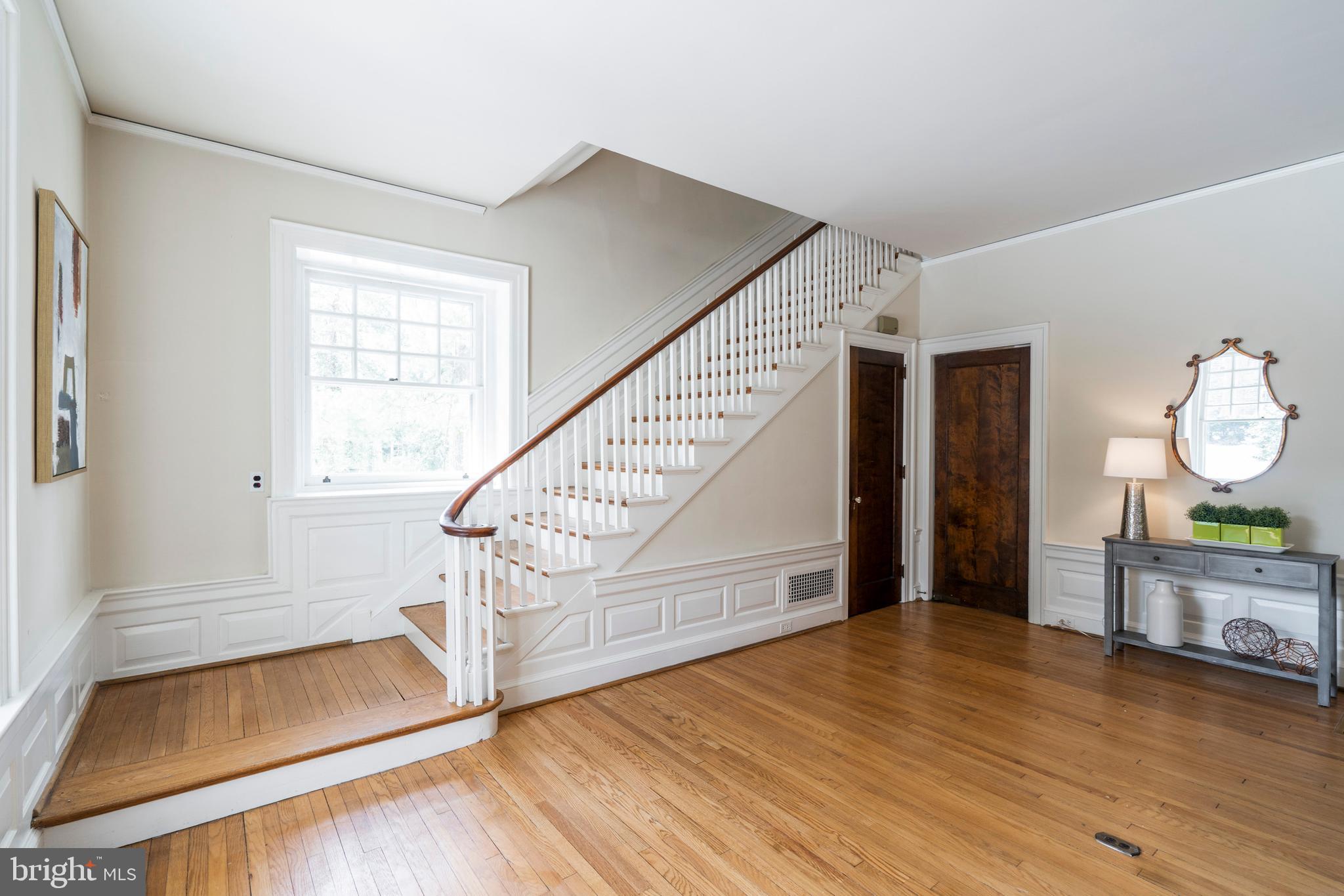 132 St Georges Road Ardmore, PA 19003 - Photo 11 of 87 a view of a room with wooden floor and staircase