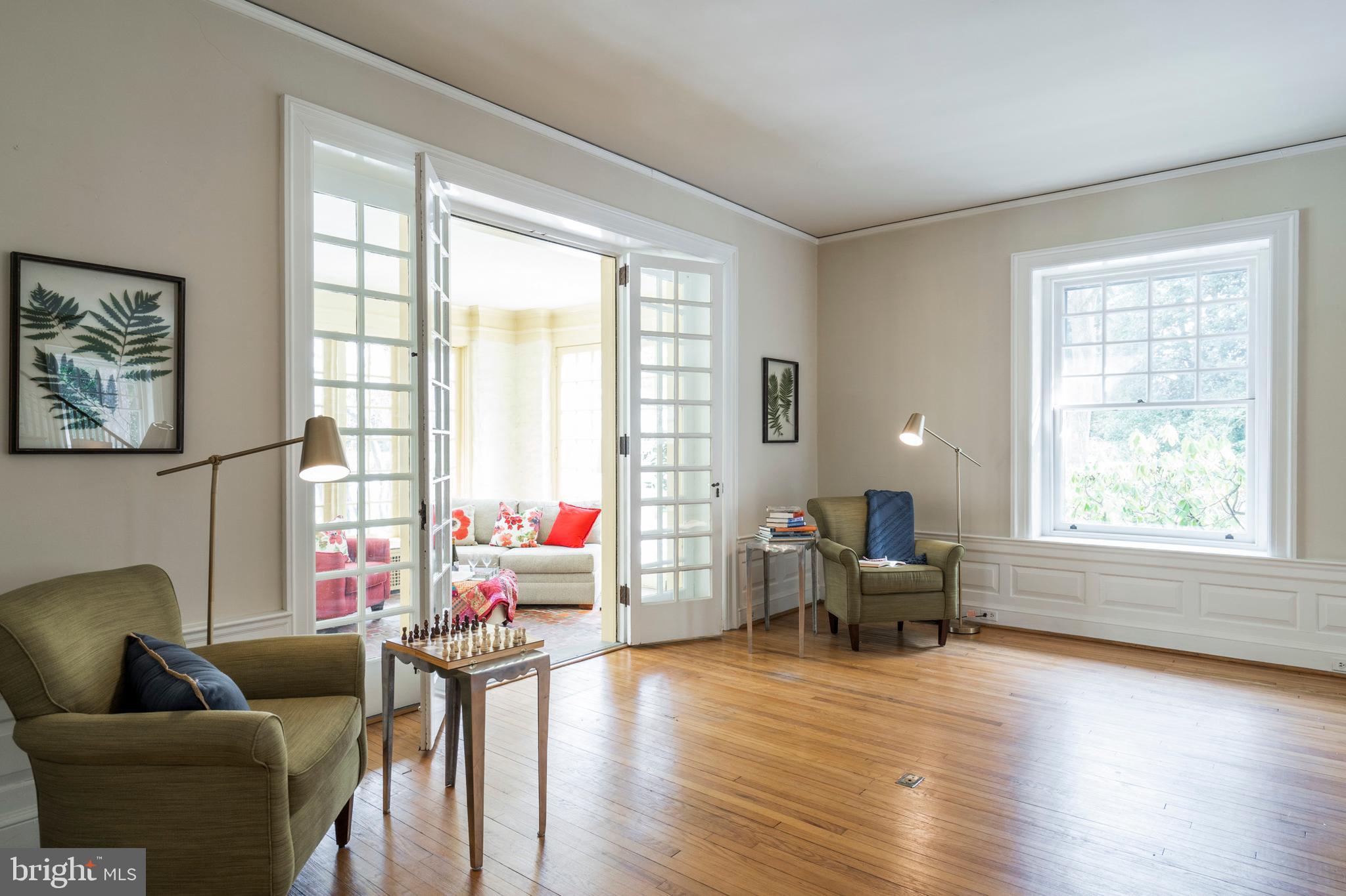 132 St Georges Road Ardmore, PA 19003 - Photo 14 of 87 a living room with furniture and floor to ceiling windows