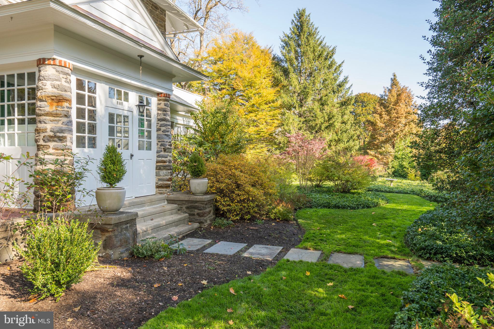 132 St Georges Road Ardmore, PA 19003 - Photo 5 of 87 a view of a house with a yard and sitting area