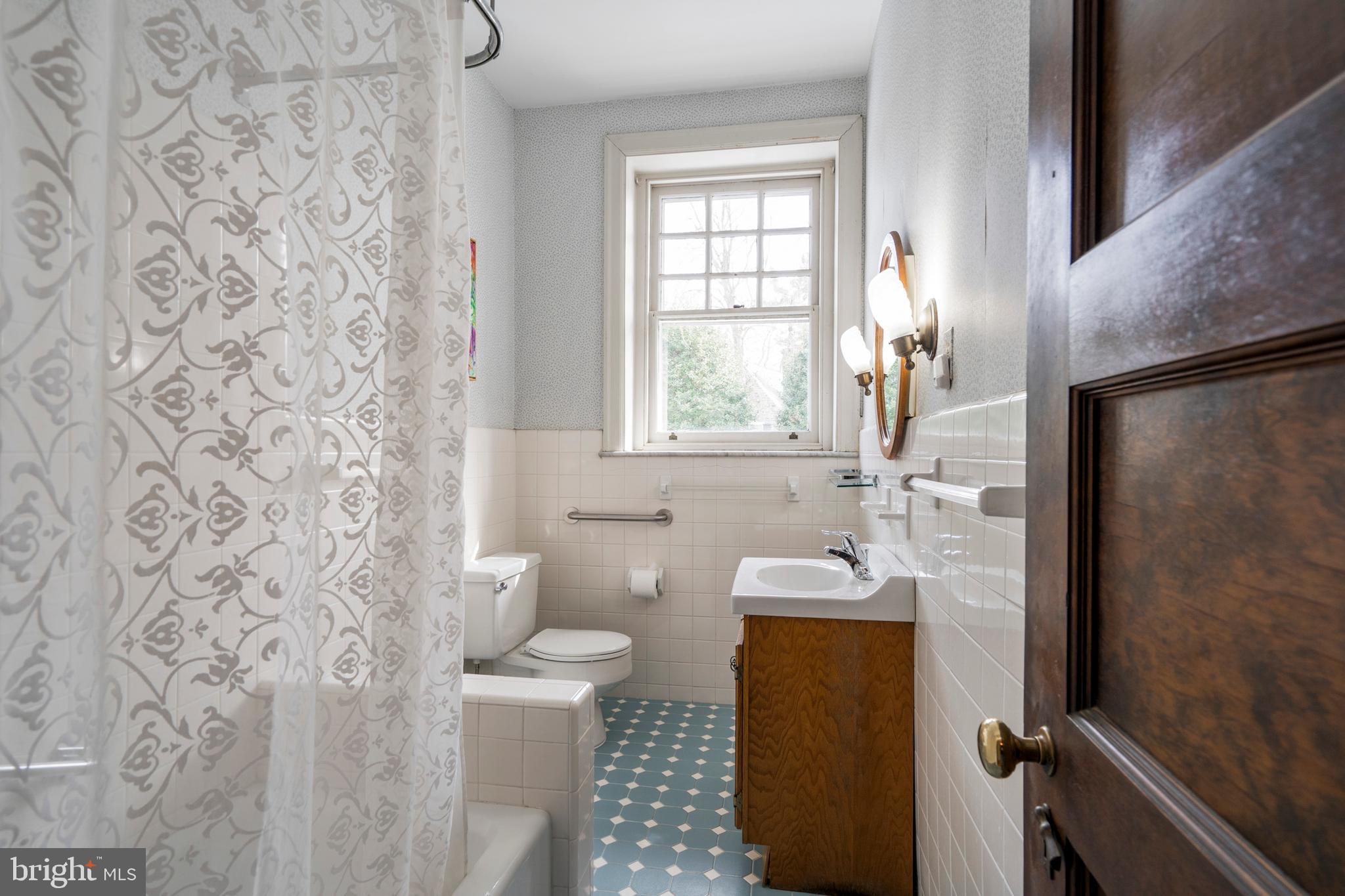 132 St Georges Road Ardmore, PA 19003 - Photo 44 of 87 a bathroom with a sink toilet and shower