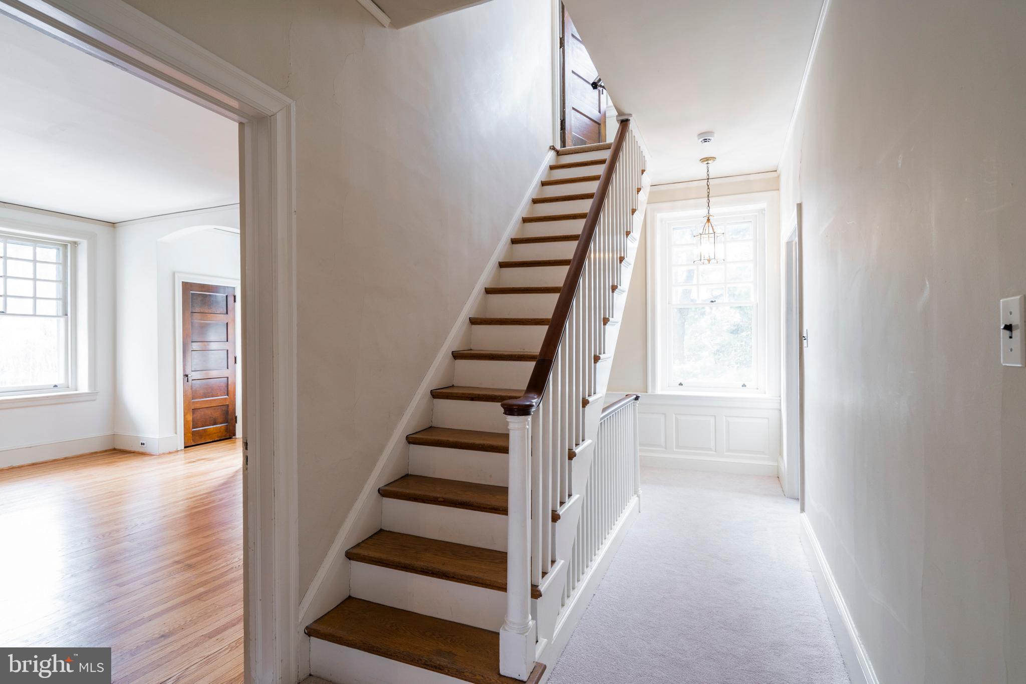 132 St Georges Road Ardmore, PA 19003 - Photo 56 of 87 a view of an entryway with wooden floor and staircase