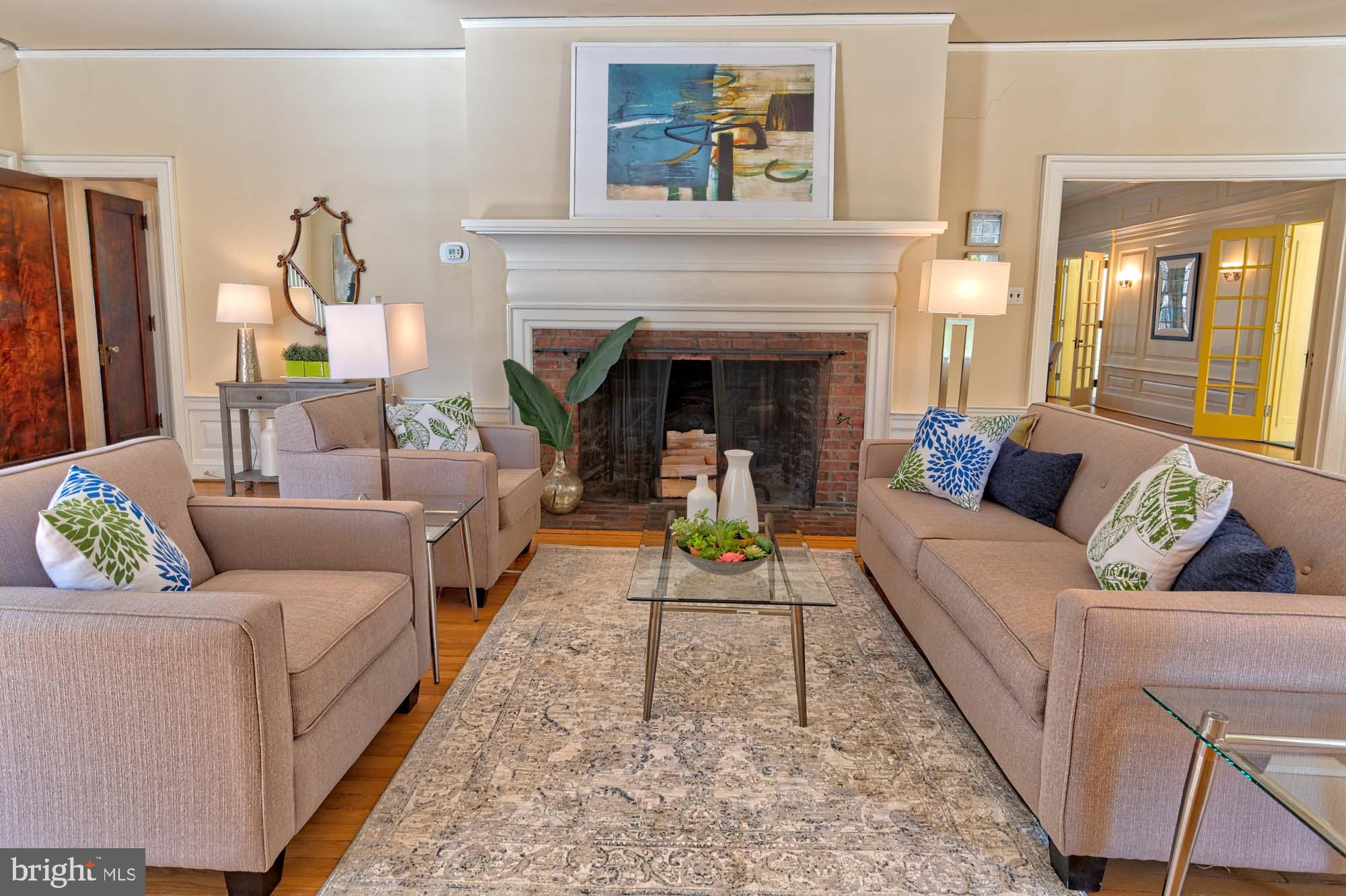 132 St Georges Road Ardmore, PA 19003 - Photo 10 of 87 a living room with furniture and a fireplace