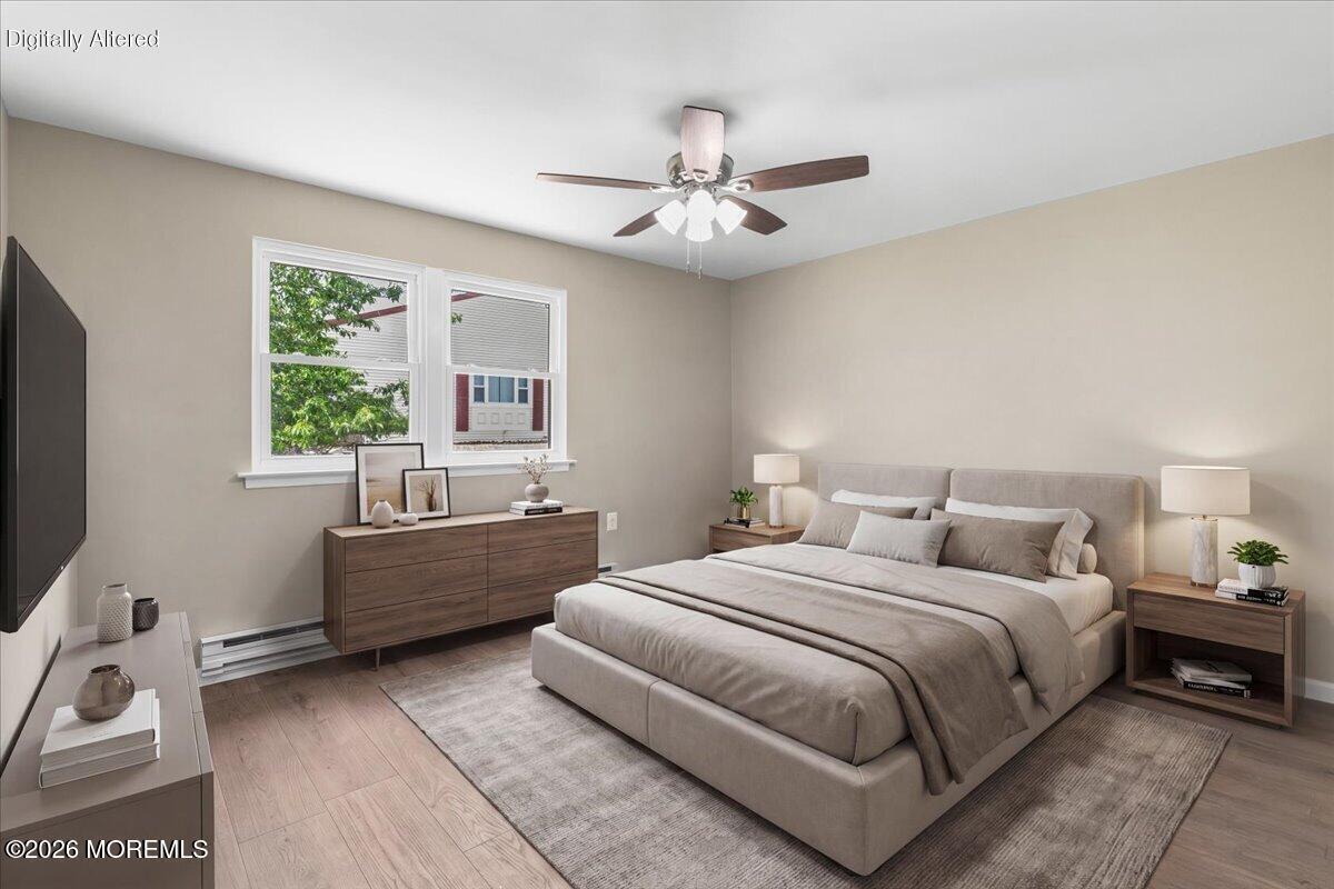 16 D Spring Street, Unit 50 Whiting, NJ 08759 - Photo 19 of 28 a bedroom with a bed and a window