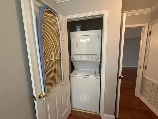 a bathroom with a sink mirror and vanity