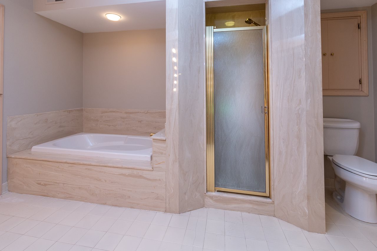 4500 Walnut Grove Road Memphis, TN 38117 - Photo 16 of 25 Soaking tub and separate shower. Double vanities