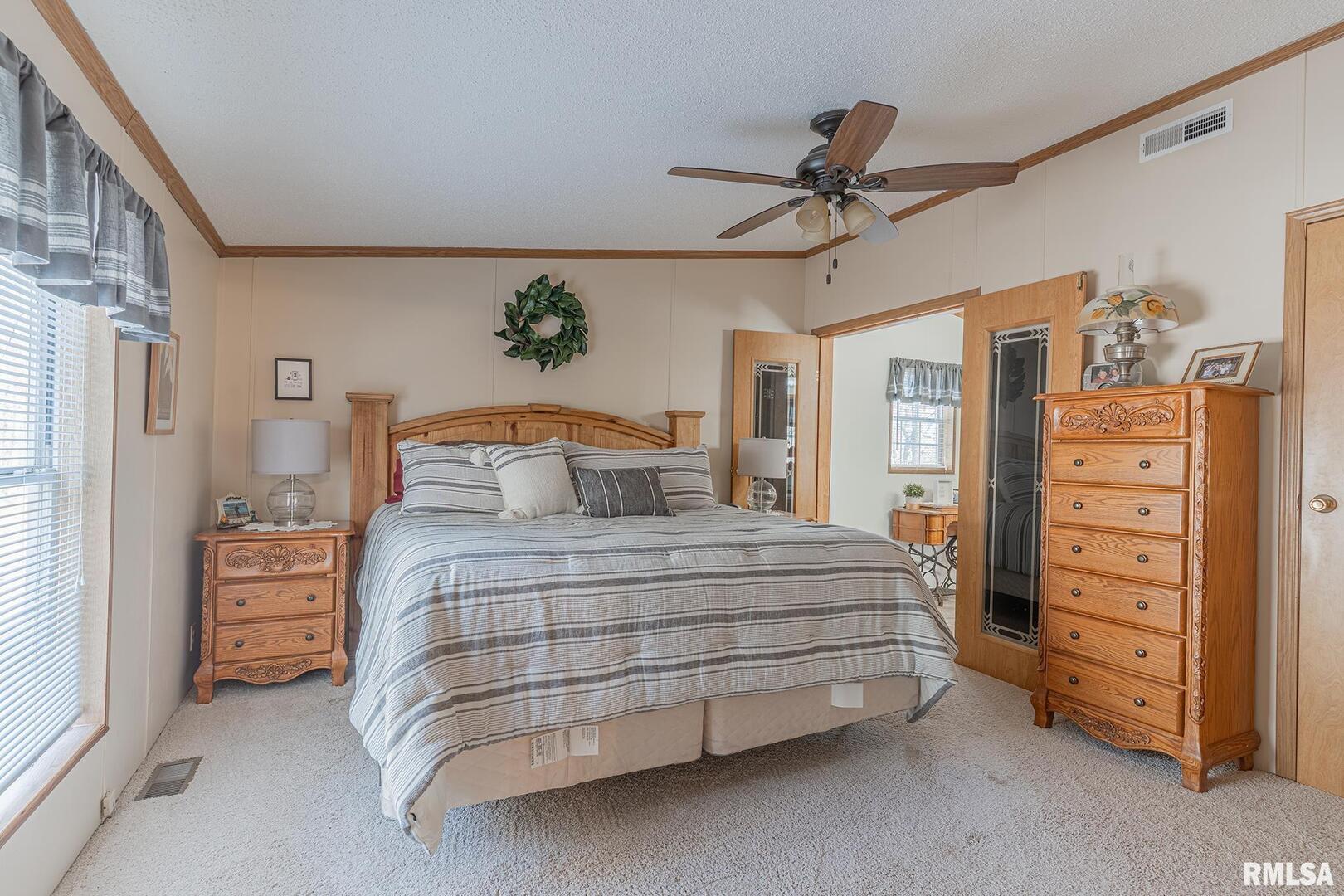 565 Dutton Chapel Road Herod, IL 62947 - Photo 50 of 54 a bedroom with a bed and a cabinets