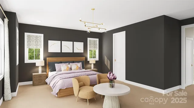 a bedroom with a bed and a table