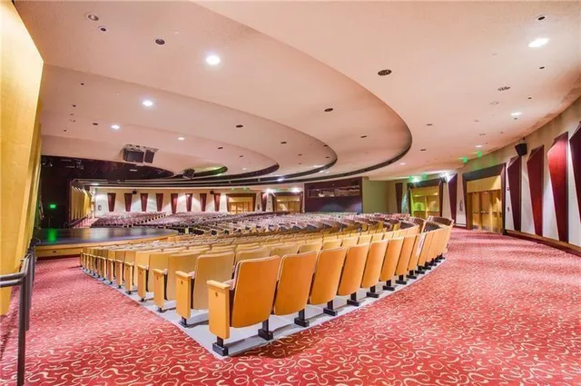 a view of a living room with a swimming pool
