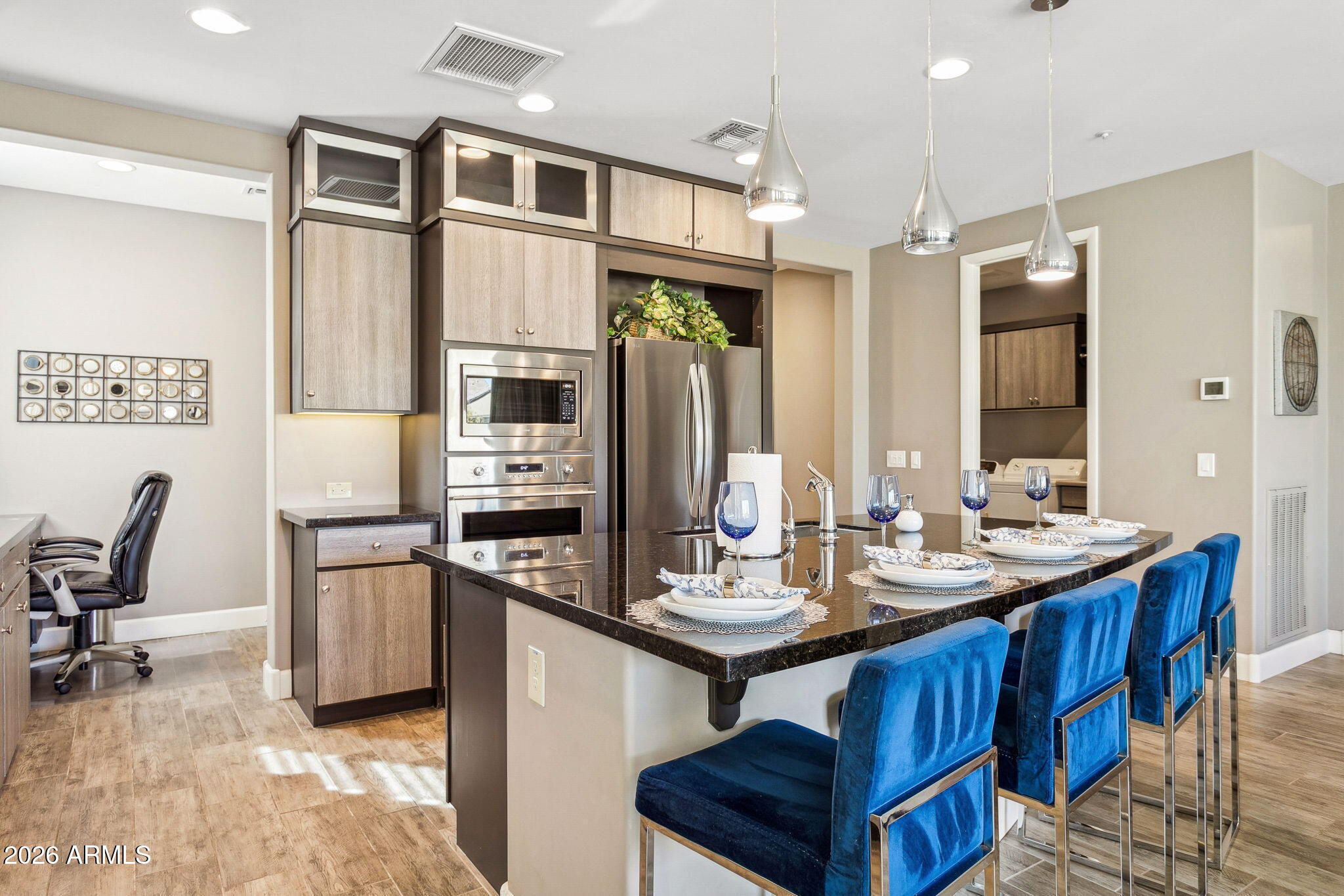 17660 East Fort Verde Road Rio Verde, AZ 85263 - Photo 12 of 56 a kitchen with stainless steel appliances granite countertop a sink refrigerator and cabinets