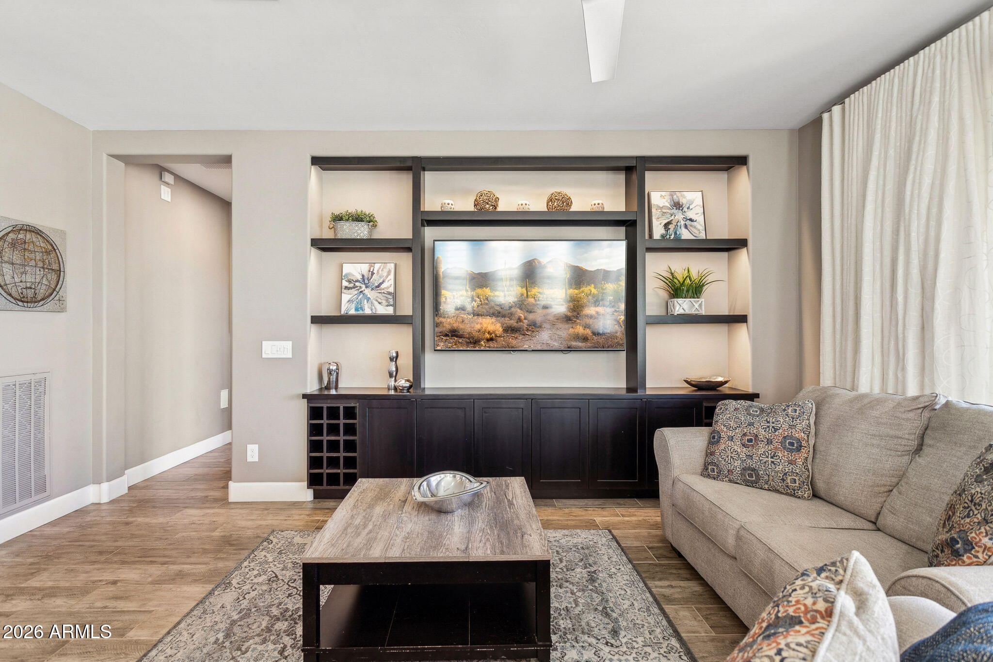 17660 East Fort Verde Road Rio Verde, AZ 85263 - Photo 17 of 56 a living room with furniture and a large window