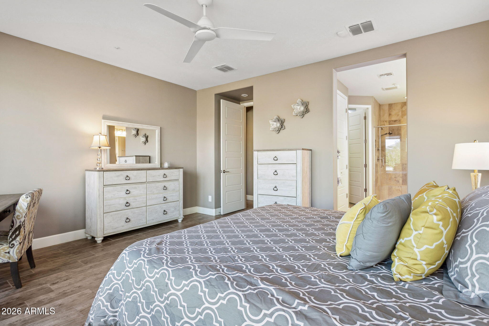 17660 East Fort Verde Road Rio Verde, AZ 85263 - Photo 21 of 56 a spacious bedroom with a bed and dresser