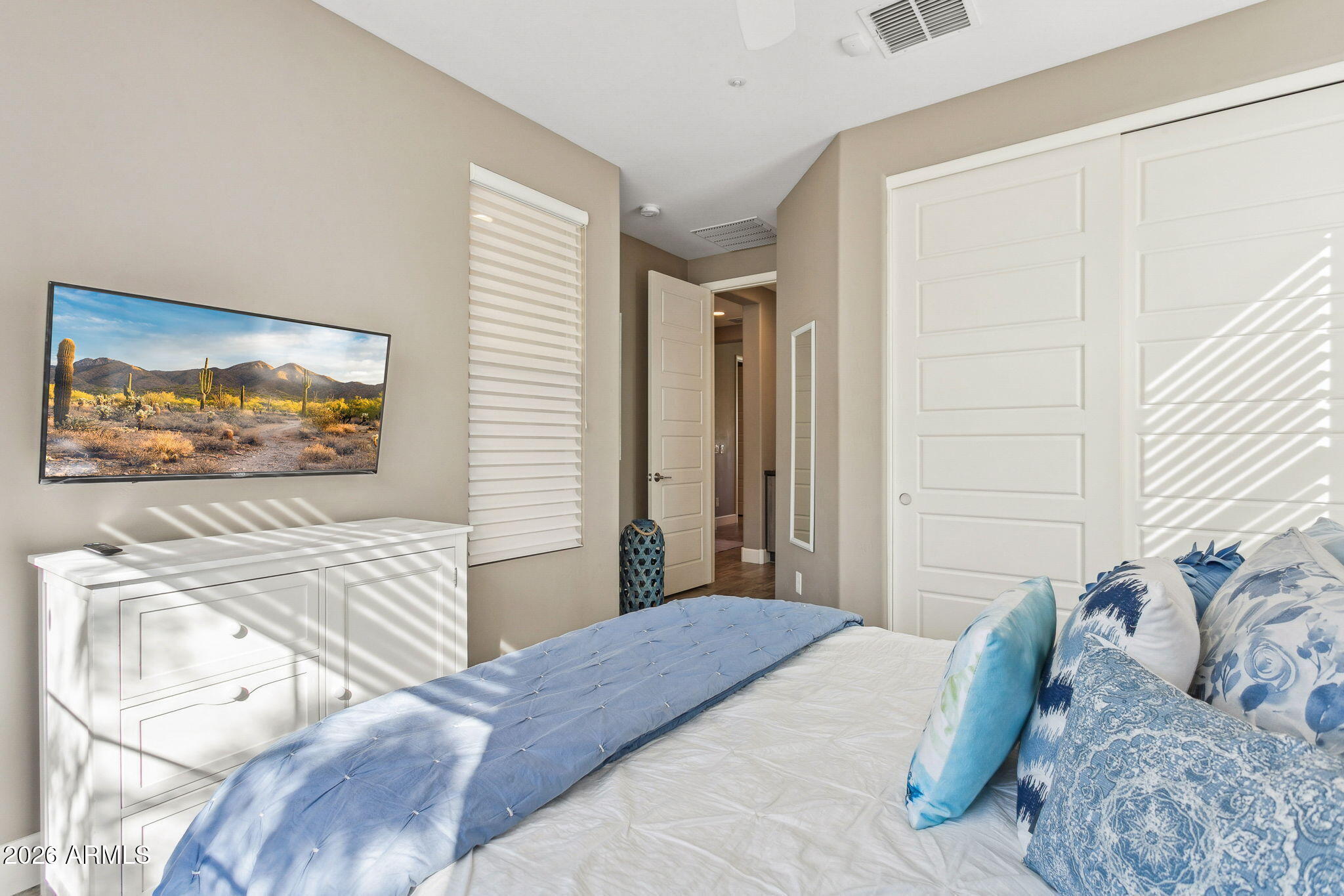 17660 East Fort Verde Road Rio Verde, AZ 85263 - Photo 27 of 56 a bedroom with a bed and a flat screen tv