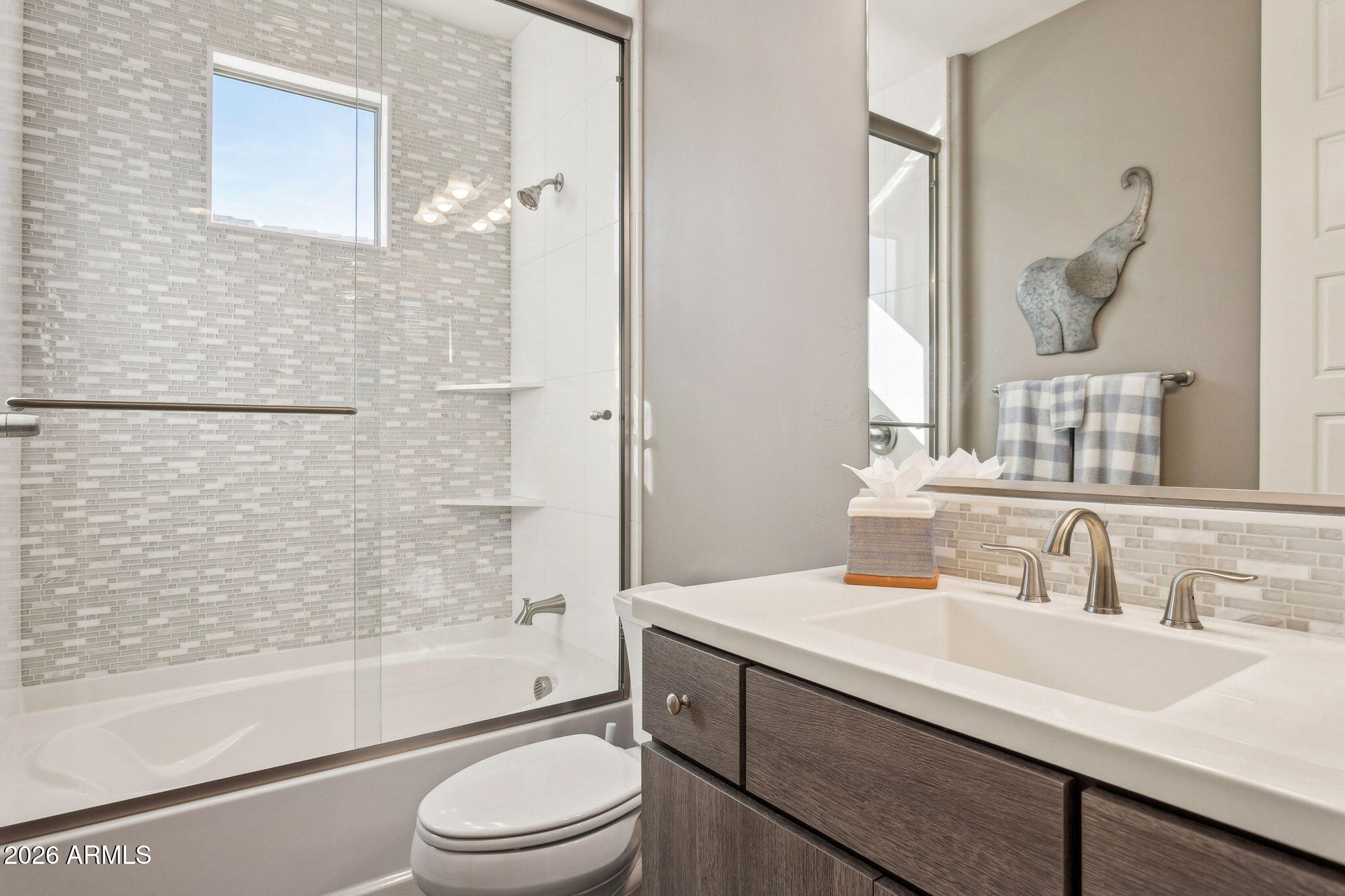 17660 East Fort Verde Road Rio Verde, AZ 85263 - Photo 30 of 56 a bathroom with a sink a toilet and shower