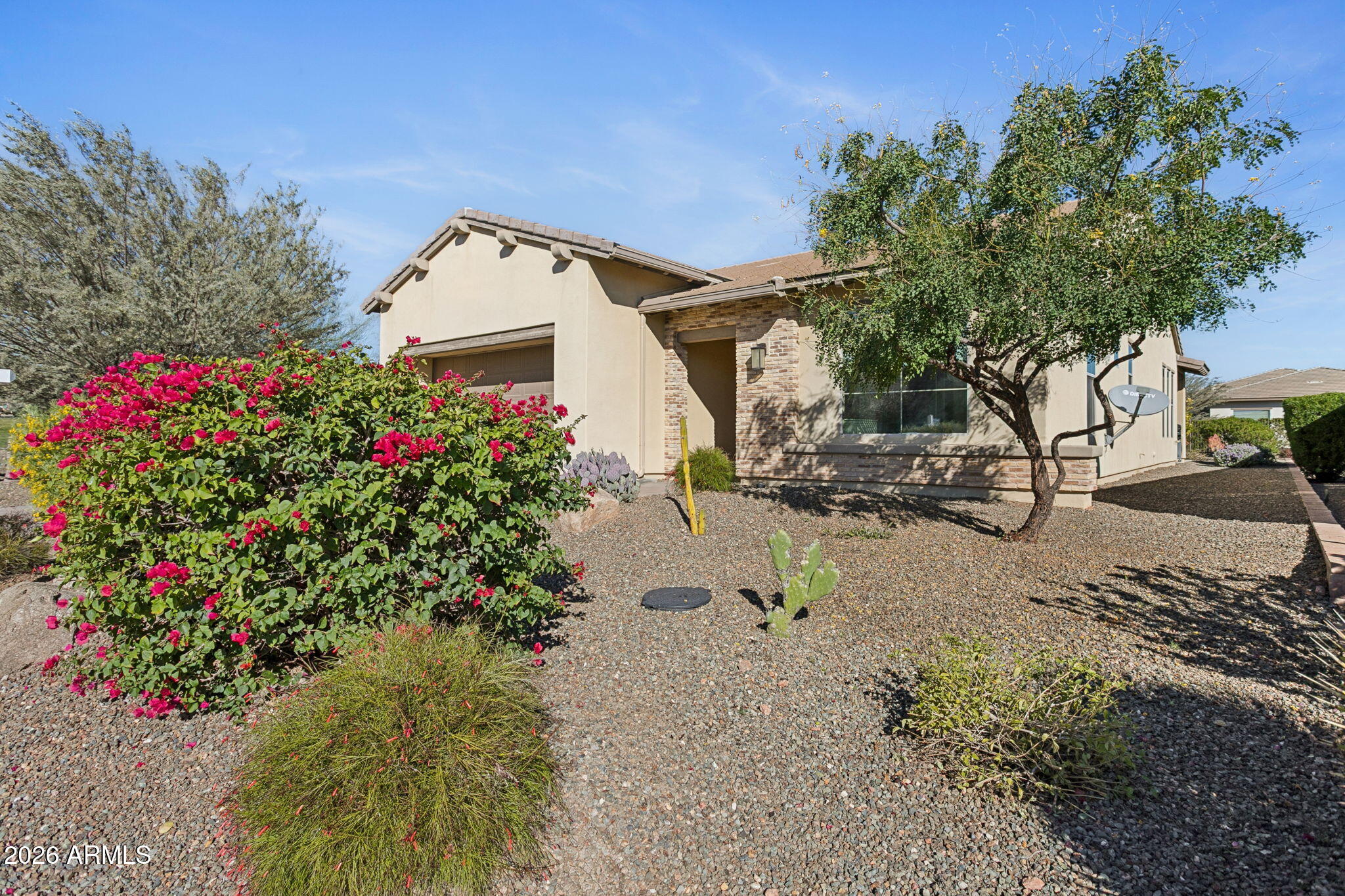 17660 East Fort Verde Road Rio Verde, AZ 85263 - Photo 3 of 56 a view of a backyard with plants and a bench