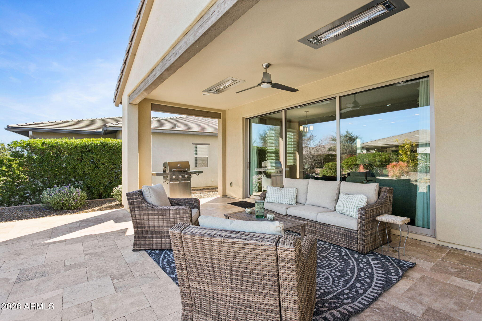 17660 East Fort Verde Road Rio Verde, AZ 85263 - Photo 34 of 56 a living room with furniture and a floor to ceiling window