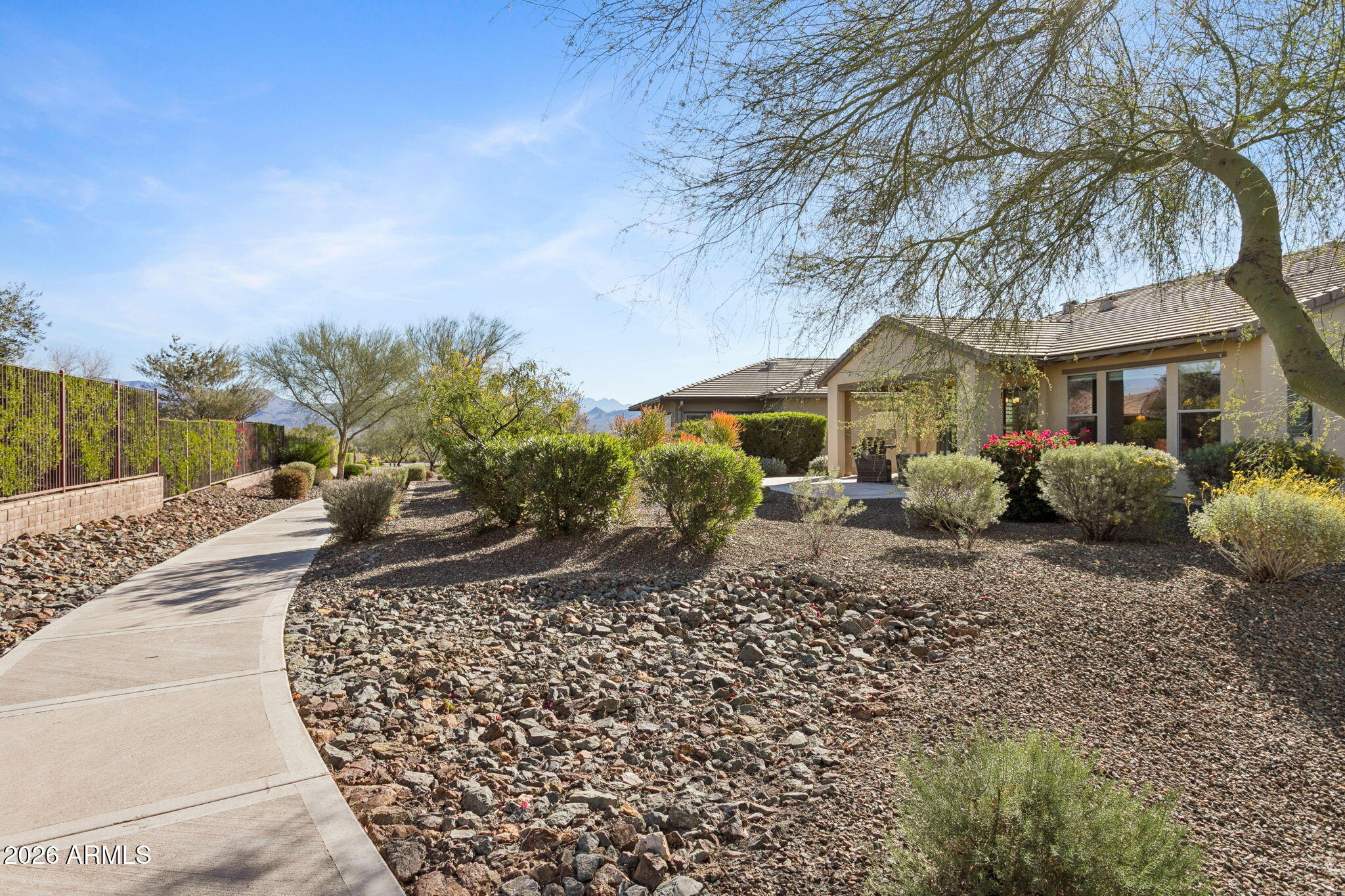17660 East Fort Verde Road Rio Verde, AZ 85263 - Photo 37 of 56 a front view of a house with garden