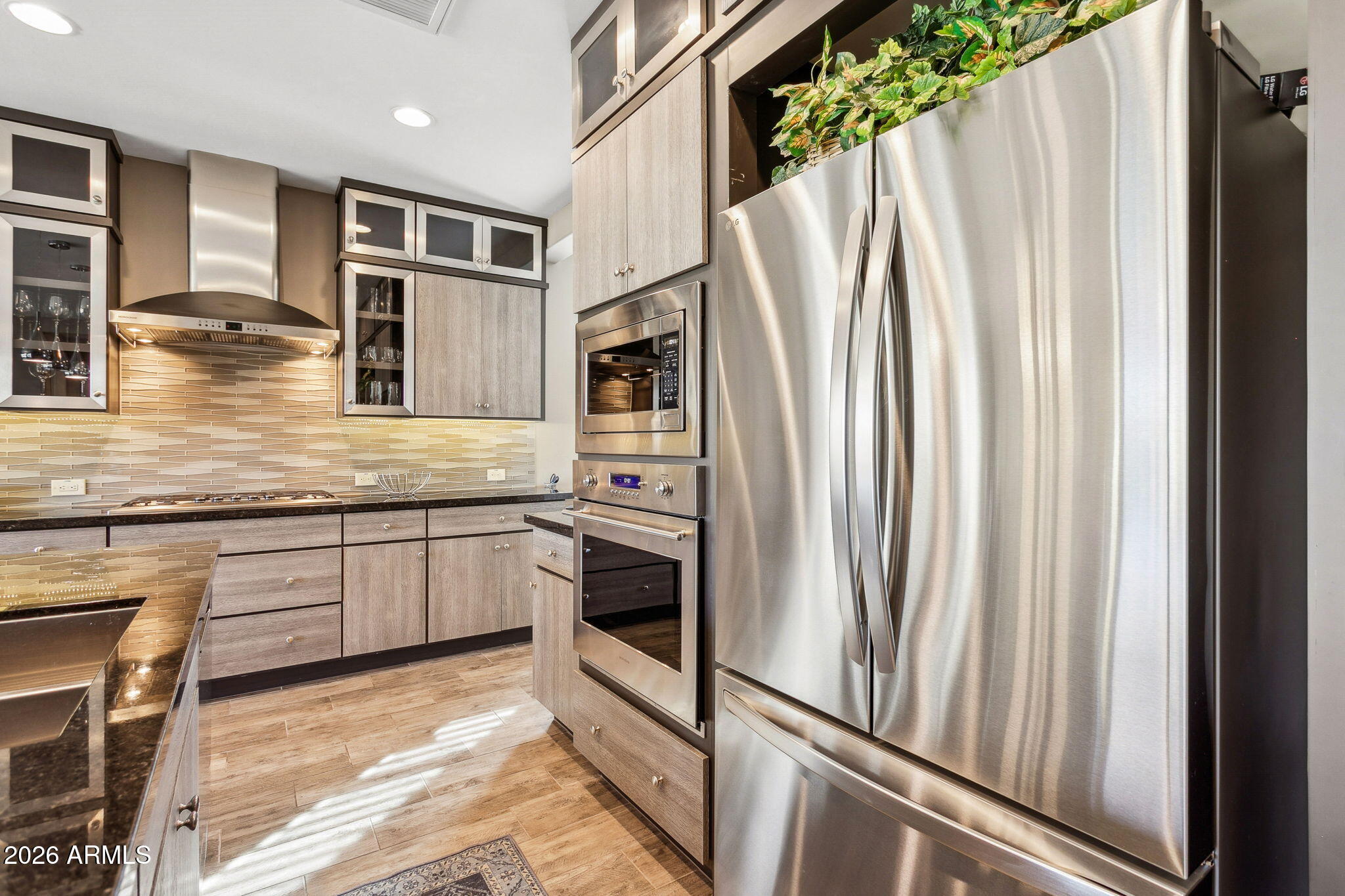 17660 East Fort Verde Road Rio Verde, AZ 85263 - Photo 8 of 56 a kitchen with stainless steel appliances granite countertop a refrigerator and a sink