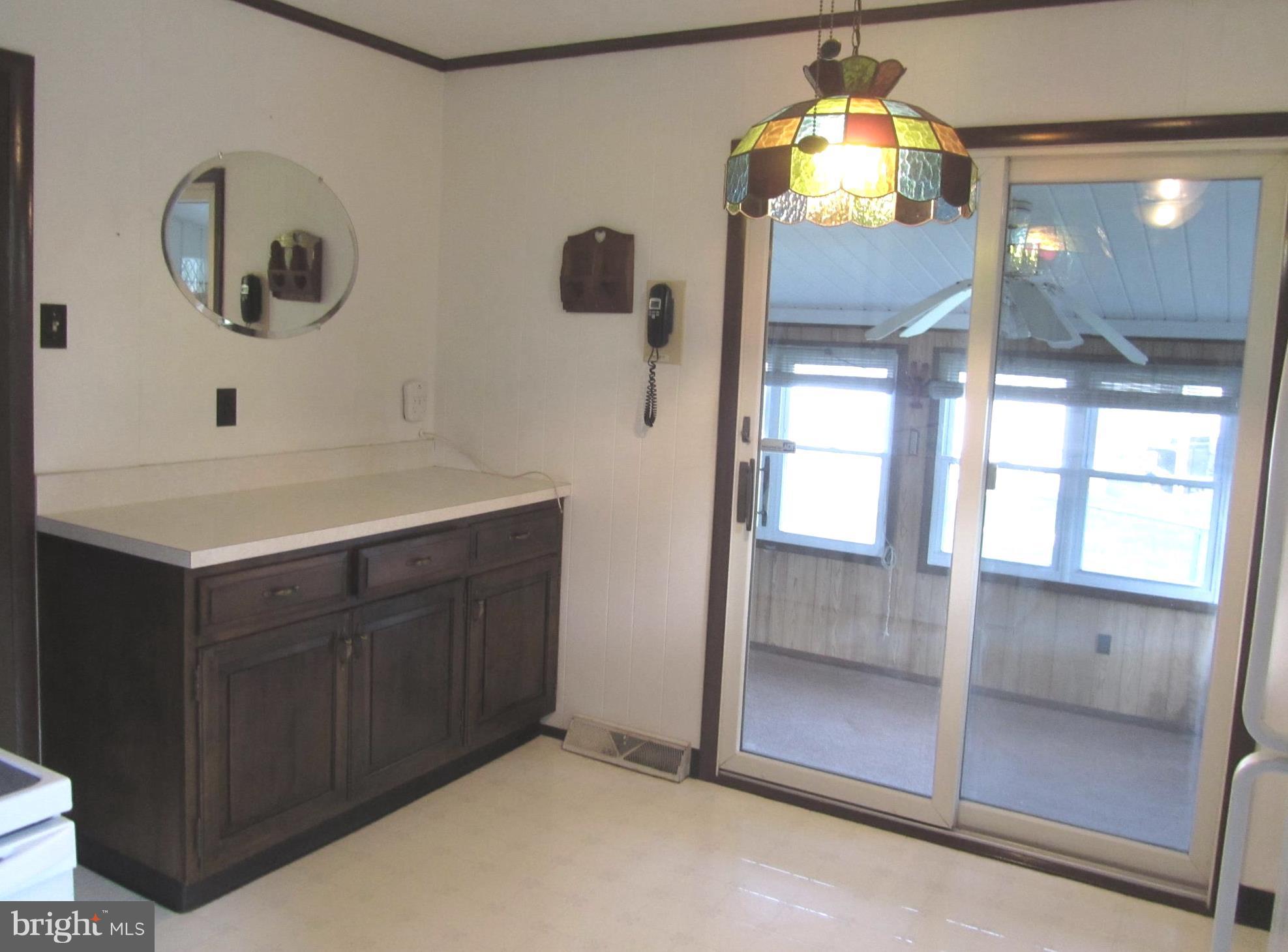 1909 Jefferson Road Baltimore, MD 21222 - Photo 12 of 22 a bathroom with a sink and a mirror