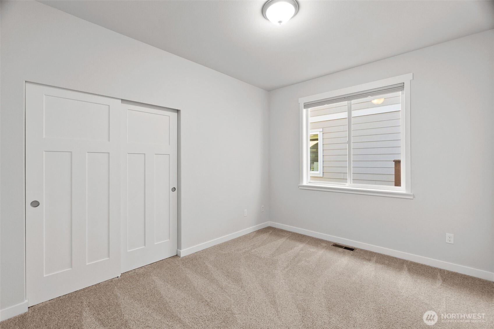 637 Maggee Street Southeast Lacey, WA 98513 - Photo 16 of 34 an empty room with windows