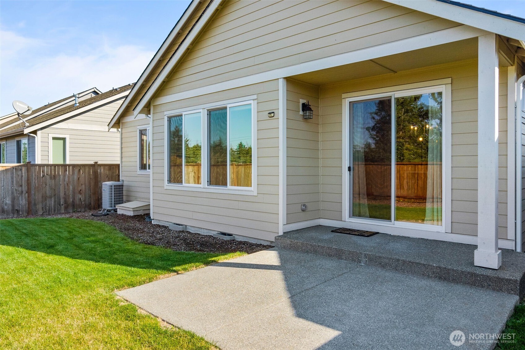 637 Maggee Street Southeast Lacey, WA 98513 - Photo 25 of 34 a front view of a house with a yard and garage