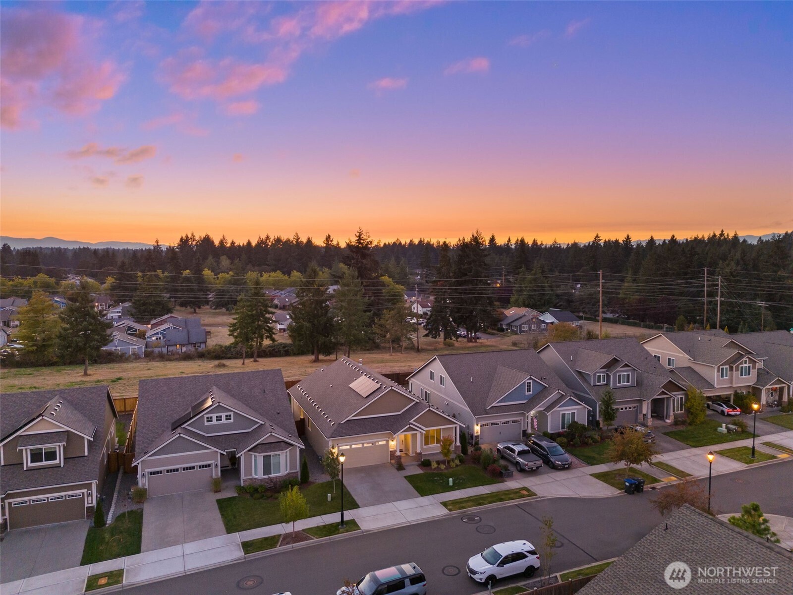 637 Maggee Street Southeast Lacey, WA 98513 - Photo 30 of 34 an aerial view of residential houses with outdoor space