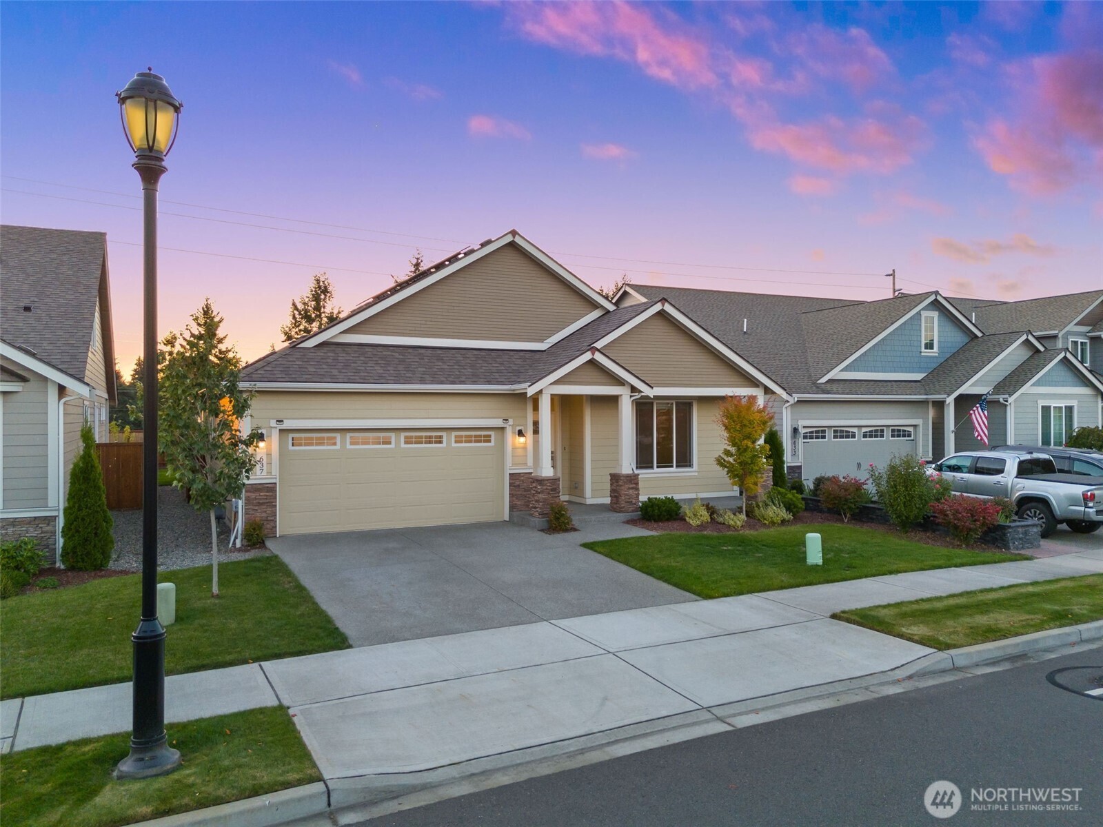 637 Maggee Street Southeast Lacey, WA 98513 - Photo 34 of 34 a front view of a house with a yard
