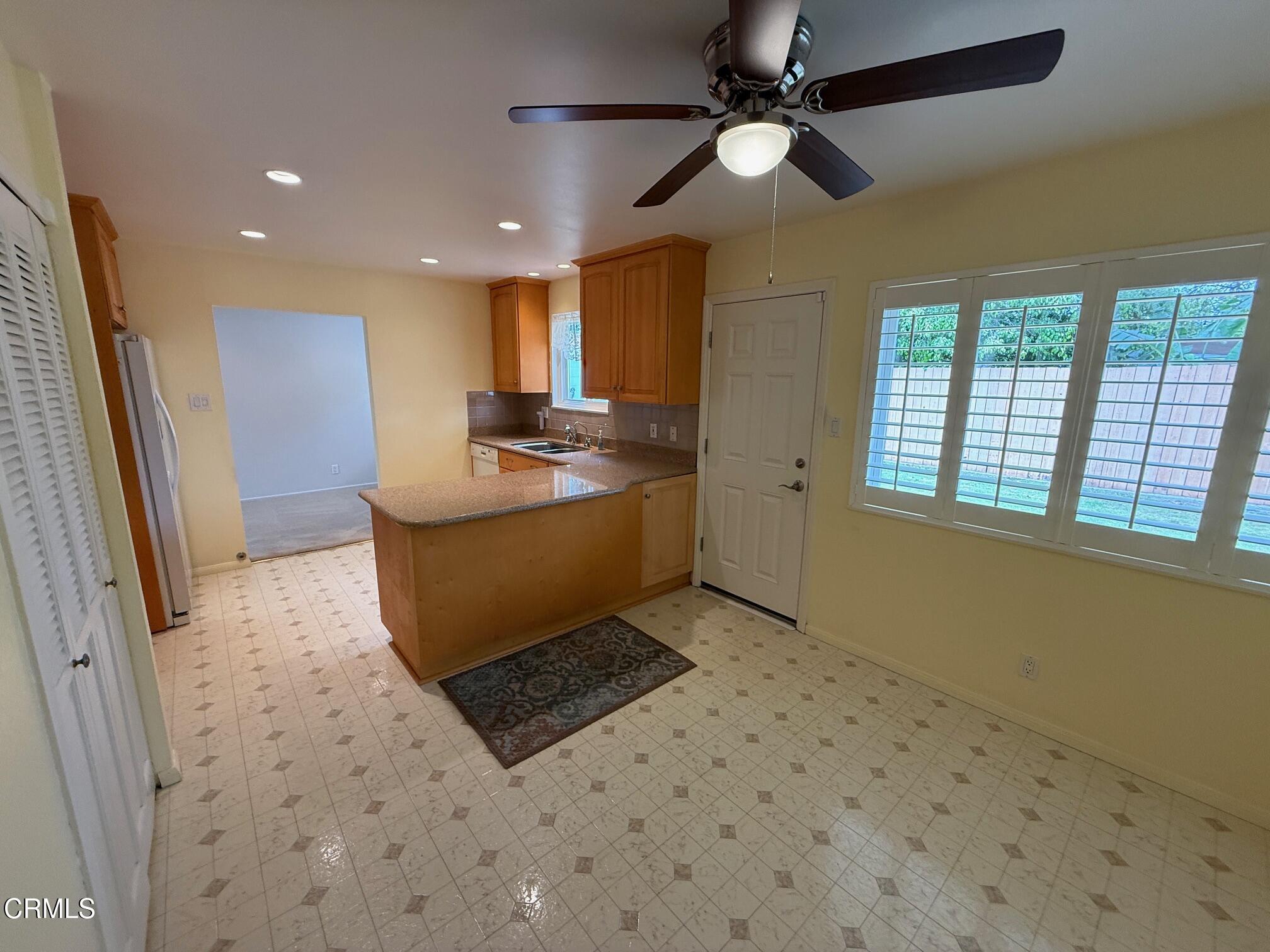545 Pearson Road Port Hueneme, CA 93041 - Photo 11 of 19 a living room with stainless steel appliances furniture a rug and a window