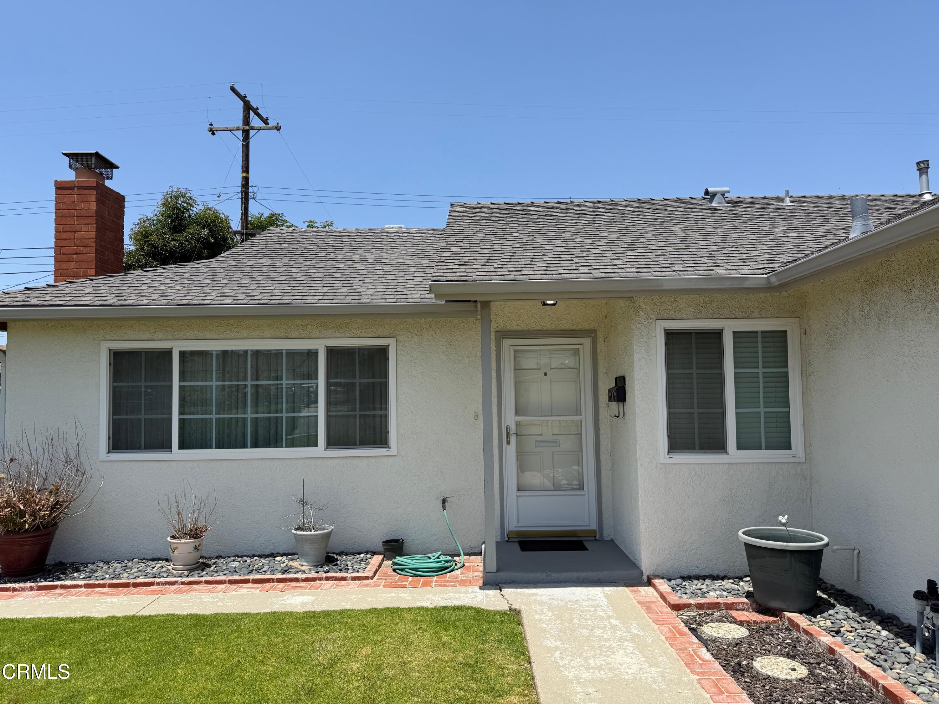 545 Pearson Road Port Hueneme, CA 93041 - Photo 5 of 19 a front view of a house with a yard