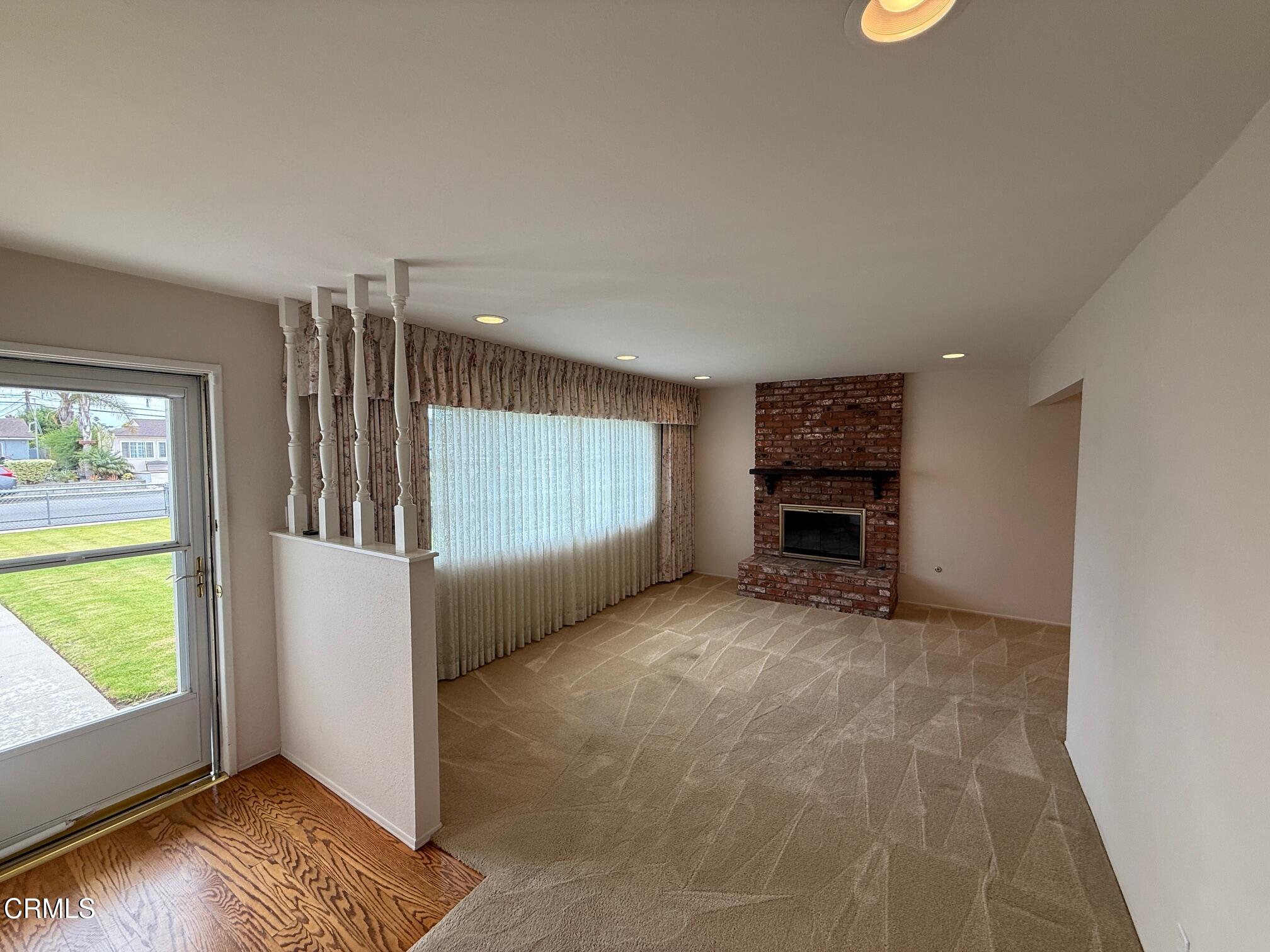 545 Pearson Road Port Hueneme, CA 93041 - Photo 6 of 19 a view of an empty room with a window and kitchen view