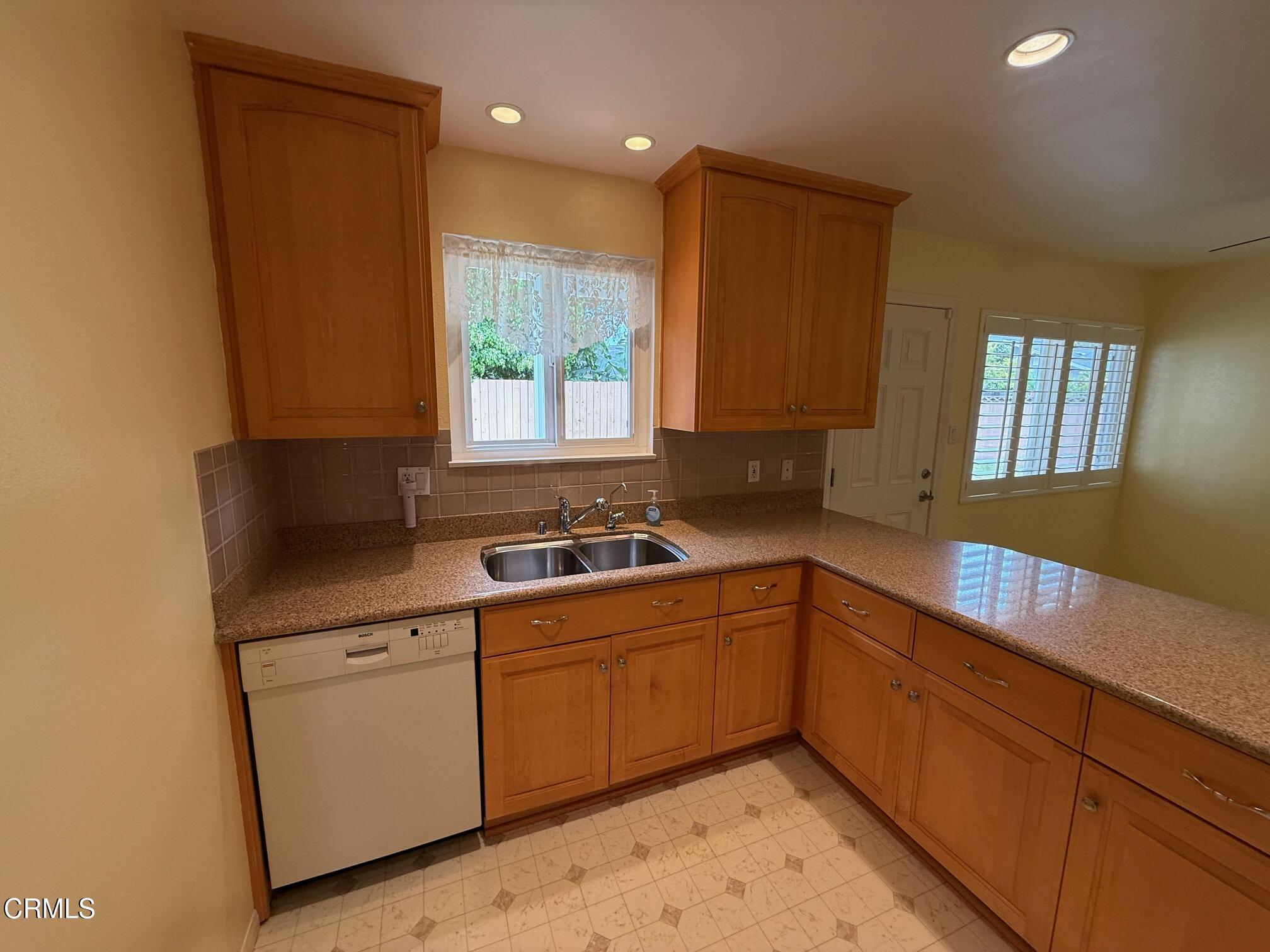545 Pearson Road Port Hueneme, CA 93041 - Photo 9 of 19 a kitchen with sink cabinets and window