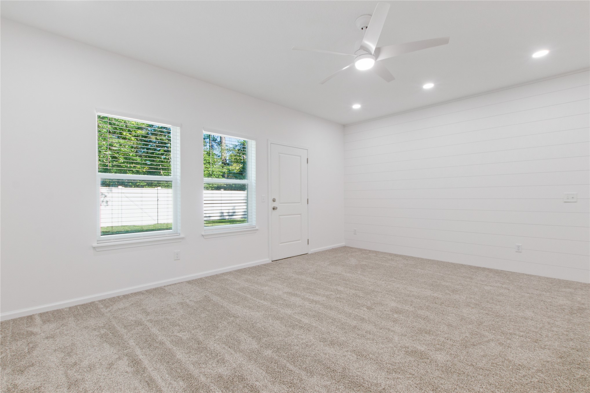 87279 Lents Road Yulee, FL 32097 - Photo 16 of 40 wooden floor in an empty room with a window