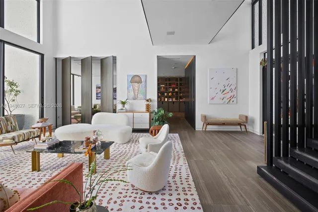 a kitchen with stainless steel appliances kitchen island granite countertop a stove and a refrigerator