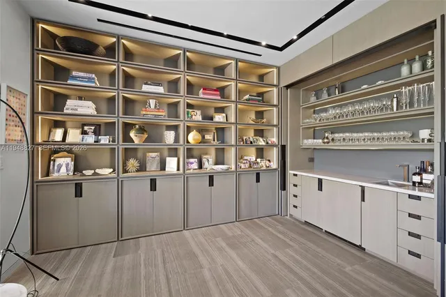 a view of an entryway with wooden floor and stairs