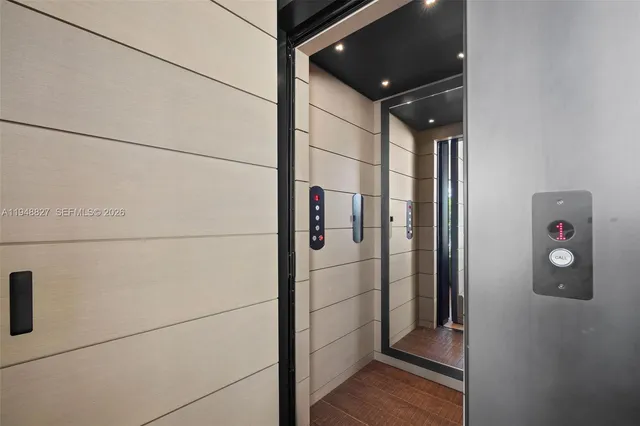 a bathroom with a toilet a sink and shower