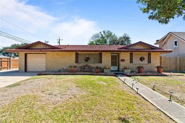 a front view of a house with entertaining space