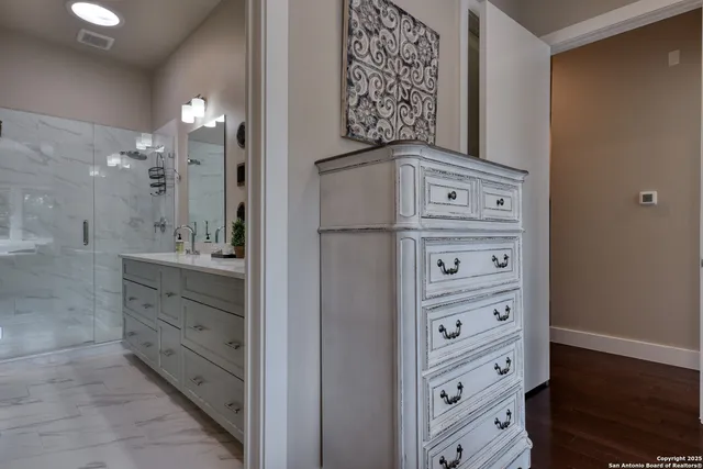 a view of cabinets walk in closet