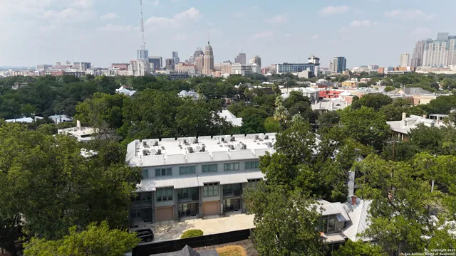 a view of a city with tall buildings