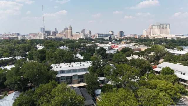 a view of a city with tall buildings